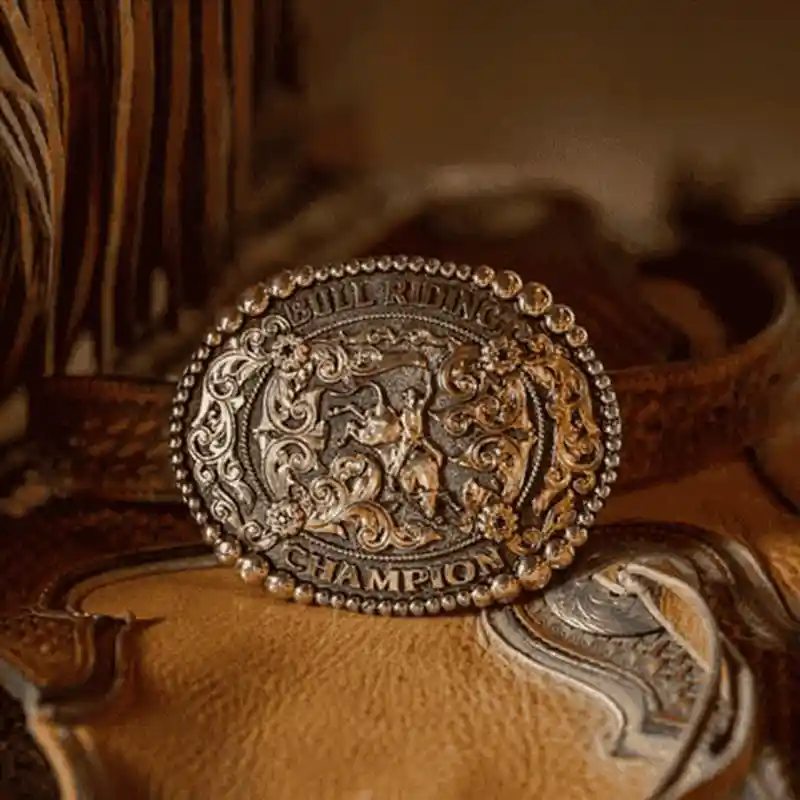 A bull riding rodeo belt buckle